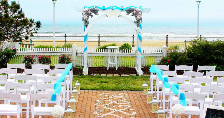 Arbor-Ceremony-with-Chairs-scaled