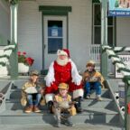 AWHM Santa with Kids on Steps 2023